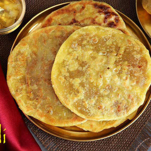 Golden sweet poli from Krithik Sweets, Iyyapanthangal Chennai — handcrafted Tamil flatbread stuffed with jaggery, chana dal, and cardamom, perfect for Deepavali celebrations and temple offerings.ஐயப்பந்தாங்கல், சென்னை Krithik Sweets-இல் தயாரிக்கப்பட்ட பொலி — வெல்லம், கடலை பருப்பு மற்றும் ஏலக்காயுடன் நிரப்பப்பட்ட பாரம்பரிய தமிழ் இனிப்பு சப்பாத்தி, தீபாவளி மற்றும் கோயில் நிவேதனத்திற்கு சிறந்த தேர்வு